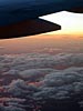 Clouds tipped with the setting sun, 39000 feet above utah