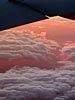 Clouds tipped with the setting sun, 39000 feet above utah