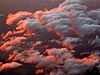 Clouds tipped with the setting sun, 39000 feet above utah