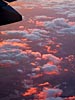 Clouds tipped with the setting sun, 39000 feet above utah