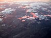 Clouds tipped with the setting sun, 39000 feet above utah